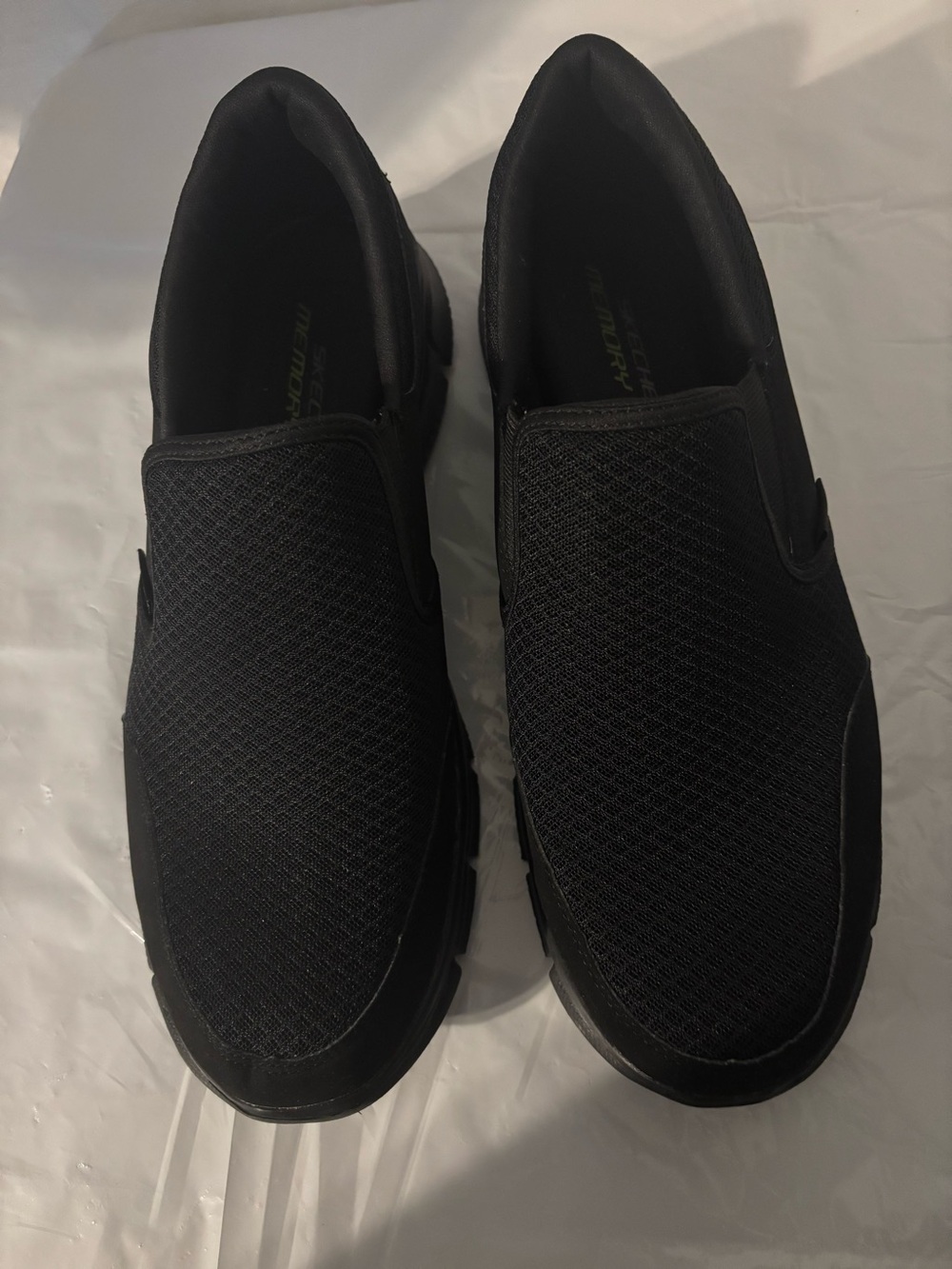 Sketchers men’s slip-in
Size 11